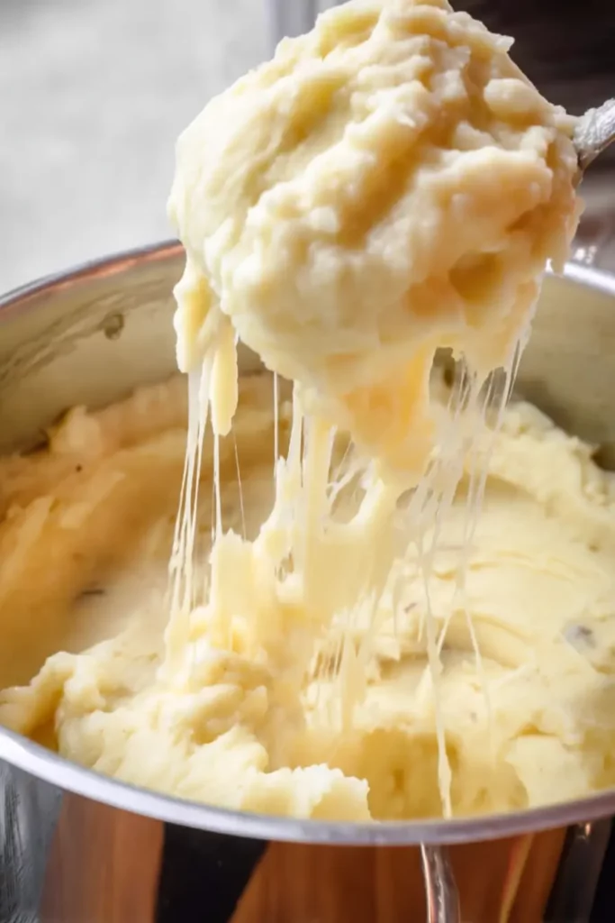 Garlic Parmesan Chicken and Gravy 19 Stretchy cheesy mashed potatoes lifted from pot