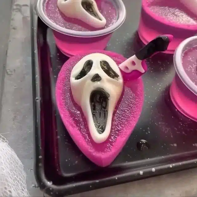 Spooky Halloween Ghostface Jello Shots Recipe 2 Creative Halloween food ideas for parties featuring spooky snacks and treats.