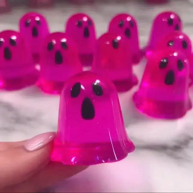 Pink Ghost Jello Shots 2 Pink Ghost Jello Shots - Festive Halloween drink with spooky theme.