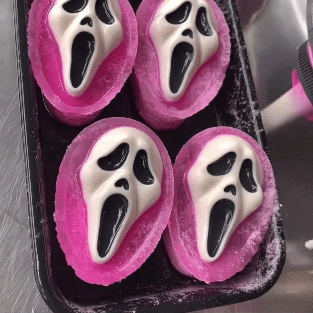 Spooky Halloween Ghostface Jello Shots Recipe 1 Creative Halloween food ideas for parties featuring spooky snacks and treats.
